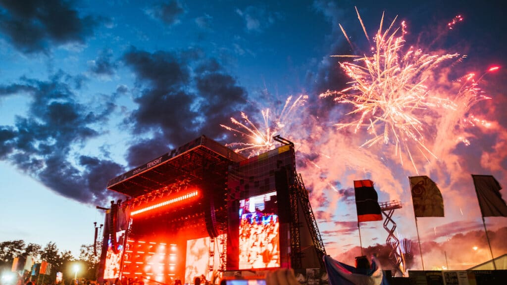 A festival MainStage erupts in fireworks