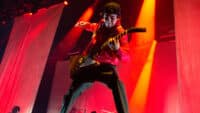 Vic Fuentes of Pierce The Veil performs at Alexandra Palace on April 13, 2024