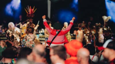 Fan on shoulders, Wildness Festival, 2024. Photo credit: Jack Geddes