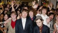 Ricky Wilson, Andrew White, Simon Rix, Peanut and Nick Hodgson of Kaiser Chiefs sign copies of their debut album, Employment, at HMV on March 7, 2005 in London.