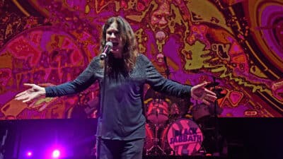 Ozzy Osbourne performing on stage with Black Sabbath in 2016