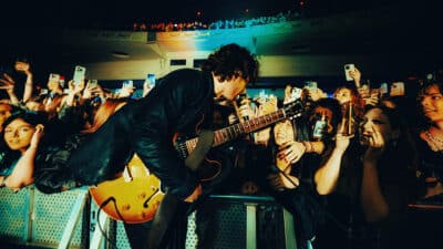 Eli Hewson of Inhaler, playing to the crowd at Brixton Academy