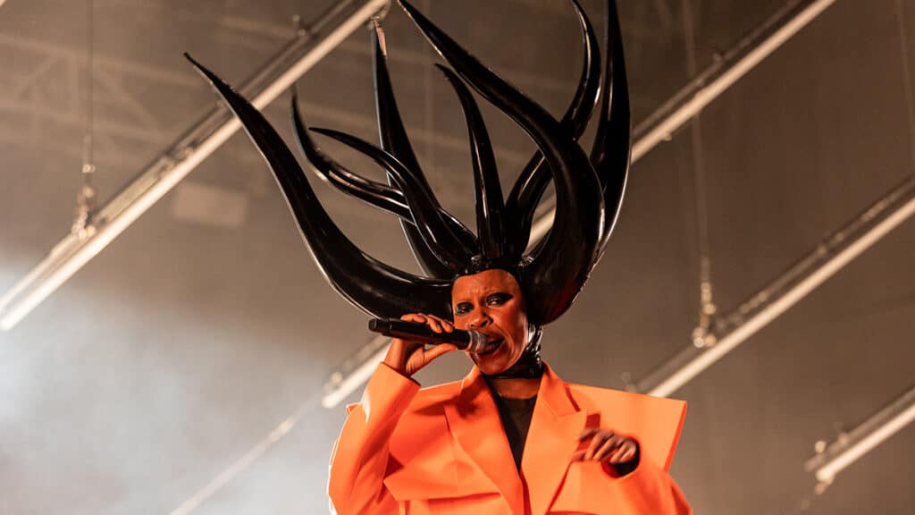Skin of Skunk Anansie performs with an elaborate spiked headpiece in 2022 in Turin, Italy.