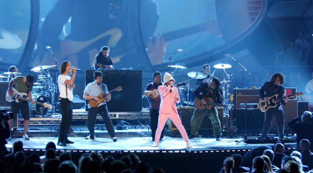 Cafe Tacuba with Incubus peforming on stage during The 5th Annual Latin Grammy awards