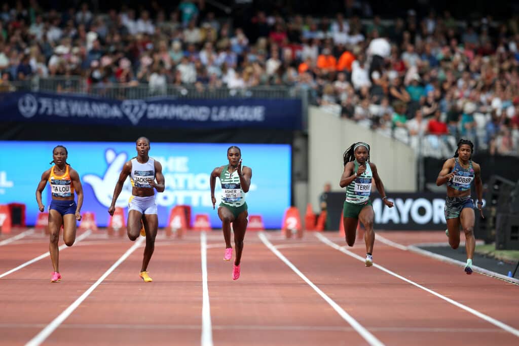 Marie-Josee Ta Lou of Team Côte d'Ivoire, Shericka Jackson of Team Jamaica, Dina Asher-Smith of Team Great Britain, Twanisha Terry of Team United States and Aleia Hobbs of United States compete in the Women's 100 Metres final during the London Athletics Meet
