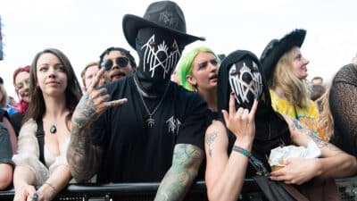 Festival goers with Sleep Token masks during Download Festival