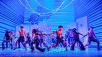 Dancers onstage in the West End production of Mamma Mia!