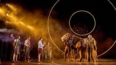 The Pevensie siblings and Aslan in the West End production of The Lion, The Witch and the Wardrobe