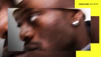 A blurry, close-up image of V.I.C inside a Ticketmaster New Music branded template