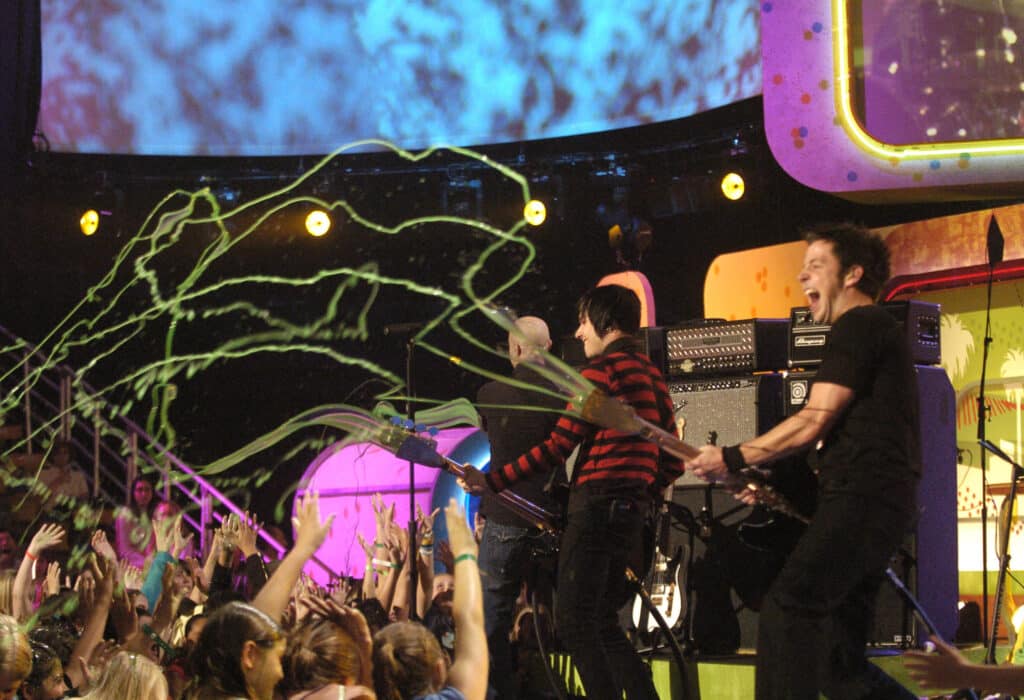 Simple Plan fire jets of slime into the crowd at The Nickelodeon Kids Choice Awards in 2005
