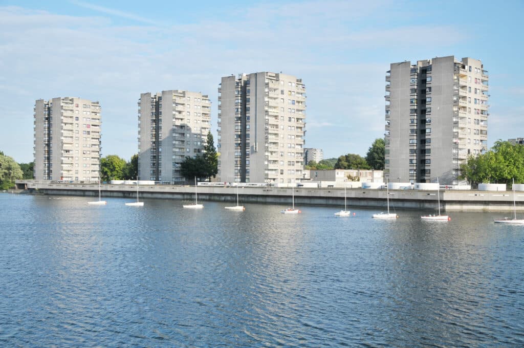 Four tower blocks next to Southmere Lake in the Thamesmead area of East London