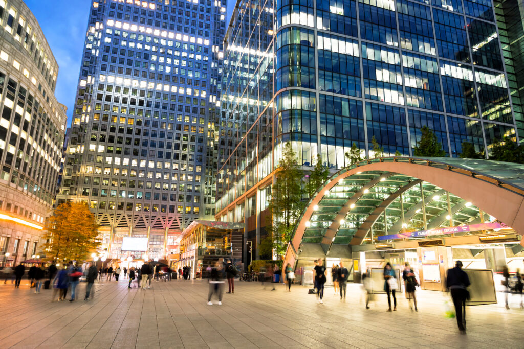 People walking through the business district of Canary Wharf in London