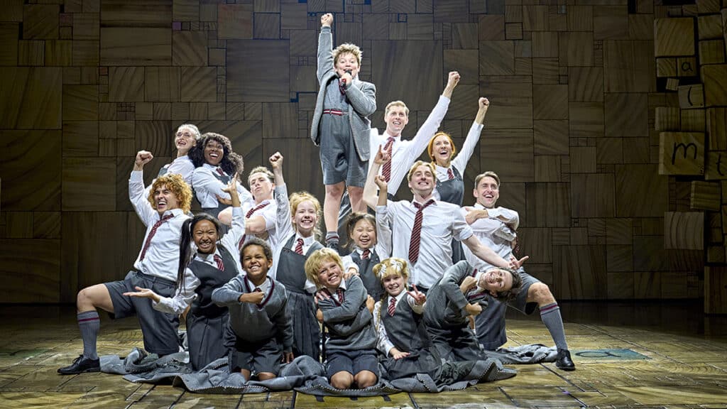 The child cast of Matilda The Musical on stage
