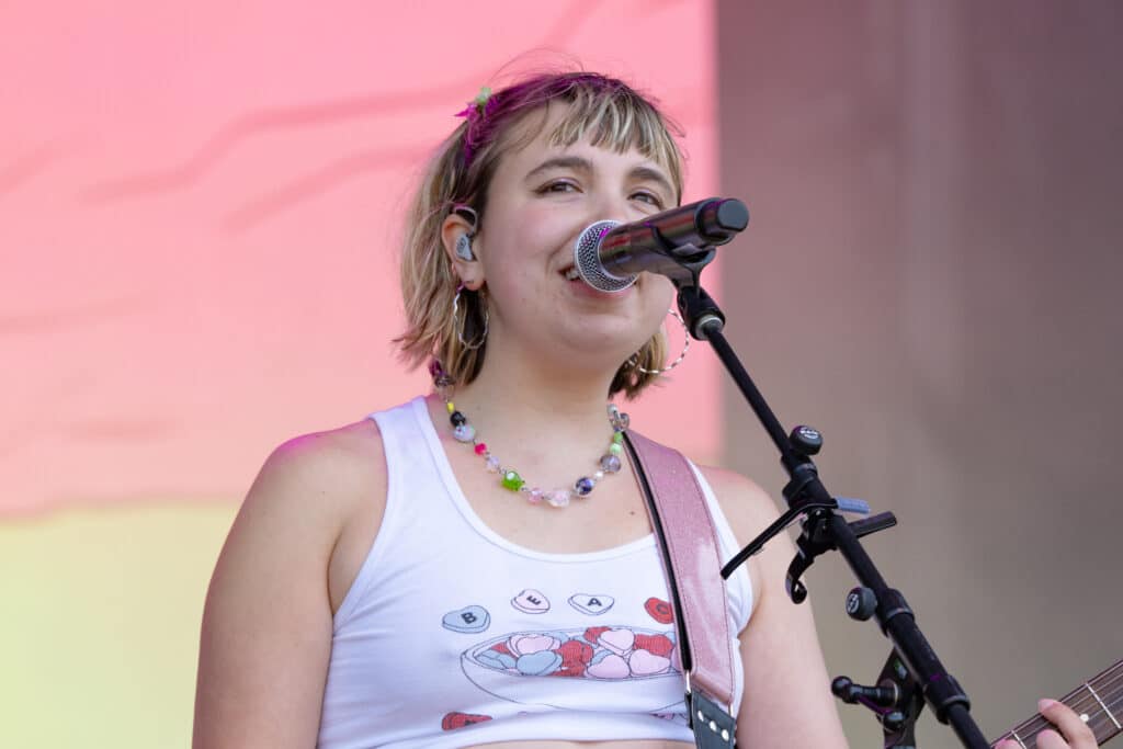 Lili Trifilio of Beach Bunny performs live on stage