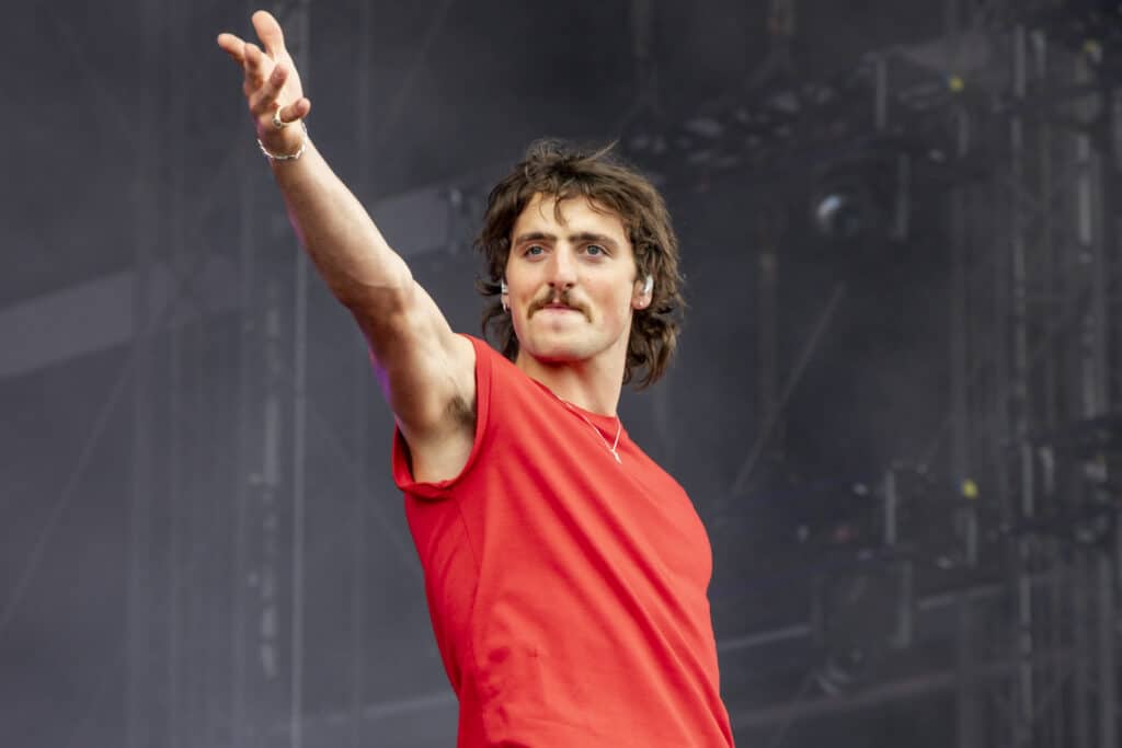 Benson Boone performs on stage