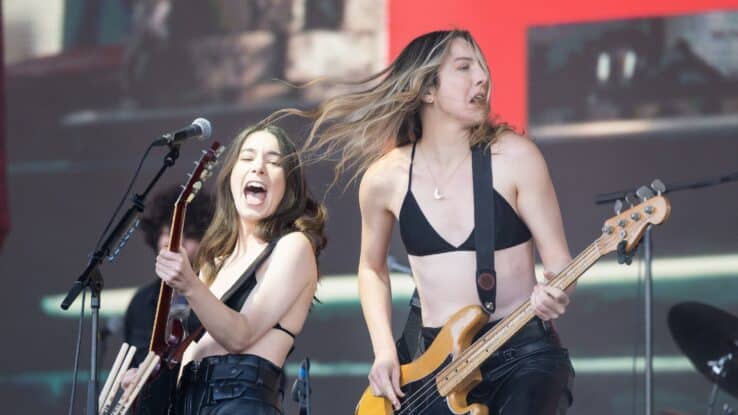 Haim performing at Glastonbury Festival in 2022.