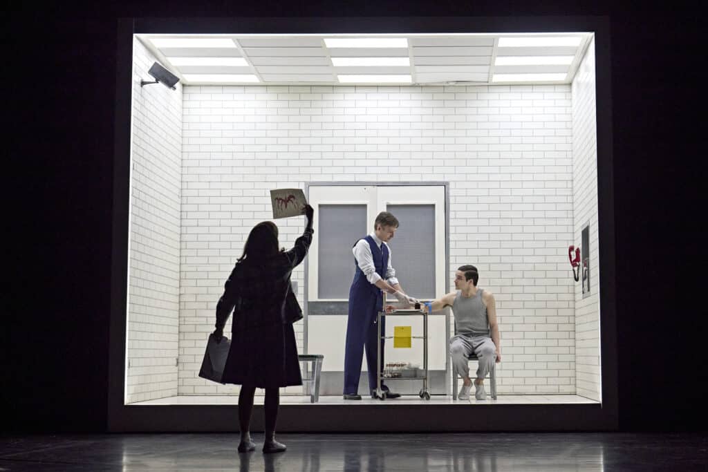 Henry Creel and Dr Brenner on stage in Stranger Things: First Shadow