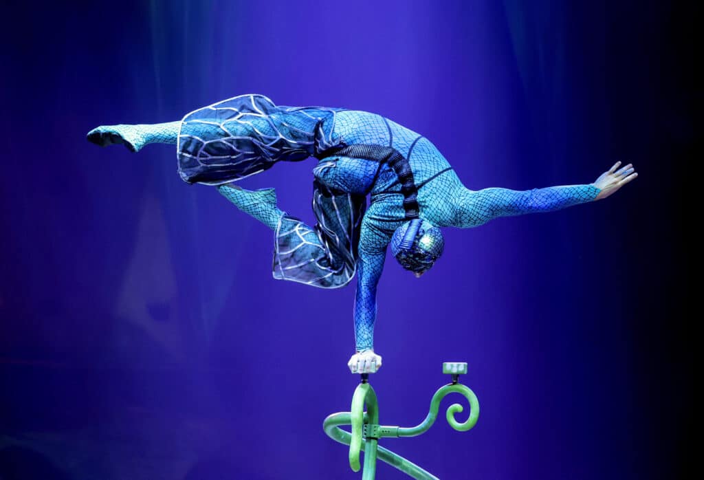An artist performs on stage during the dress rehearsal of Cirque Du Soleil's "OVO" at The Royal Albert Hall