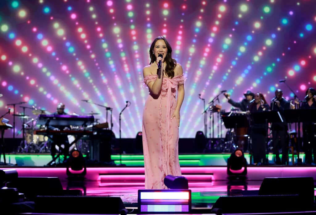 The singer Laufey performing live on stage