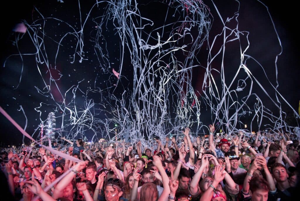 David Guetta crowd getting covered with streamers on day 2 of The Isle of Wight festival at Seaclose Park on June 9, 2017 in Newport, Isle of Wight