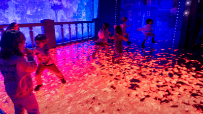 Children playing in the Coco display at Mundo Pixar Experience