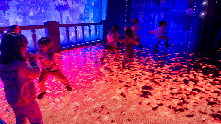 Children playing in the Coco display at Mundo Pixar Experience