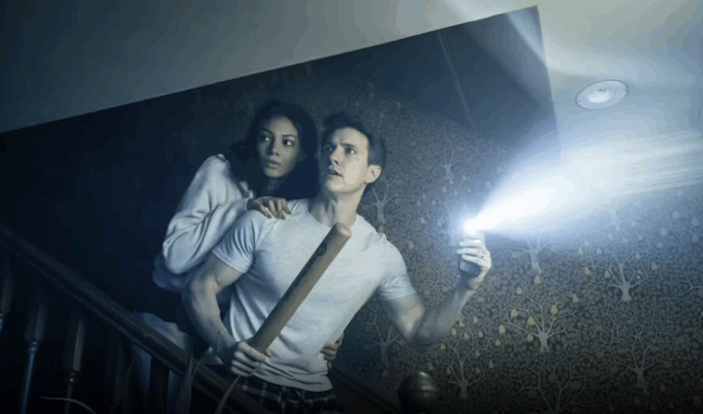 Actors onstage during a live performance of the West End show Paranormal Activity