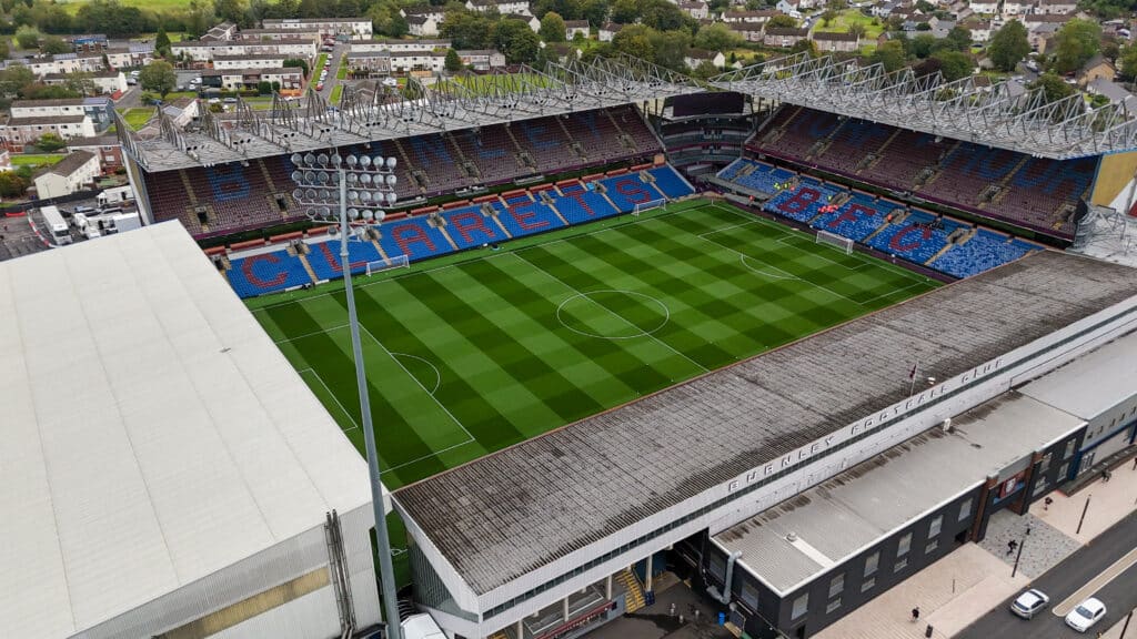 Arial view of Turf Moor stadium, showing the pitch and the stands
