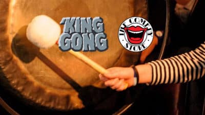 King Gong at The Comedy Store, showing a hand hitting a gong
