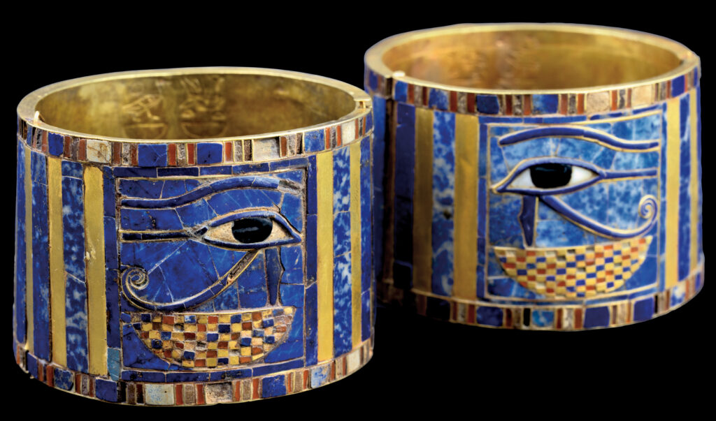 Decorated, inlaid amulets