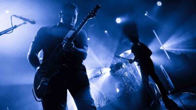 Vocalist and guitarist Dustin Kensrue and guitarist Teppei Teranishi of Thrice perform on stage