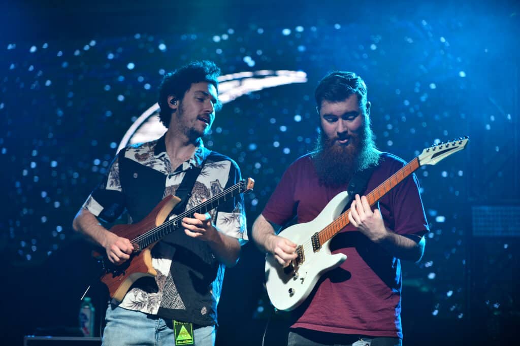 Guitarist and songwriter Plini Roessler-Holgate and Guitarist Jake Howsam Lowe of Plini performing live onstage