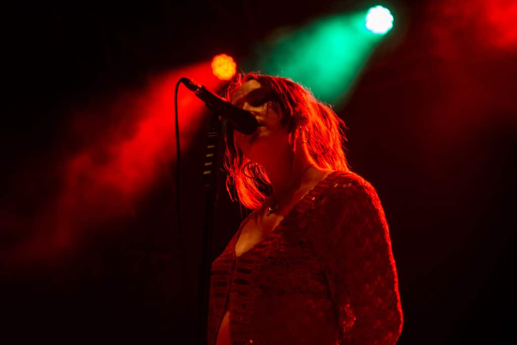 Katie Ball of the group Just Mustard performing live on stage