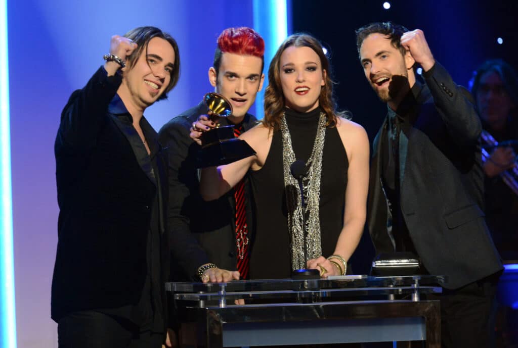 Joe Hottinger, Arejay Hale, Lzzy Hale, and Josh Smith of Halestorm accepting their Grammy win in LA, 2013 
