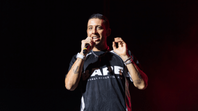 Example performing live onstage