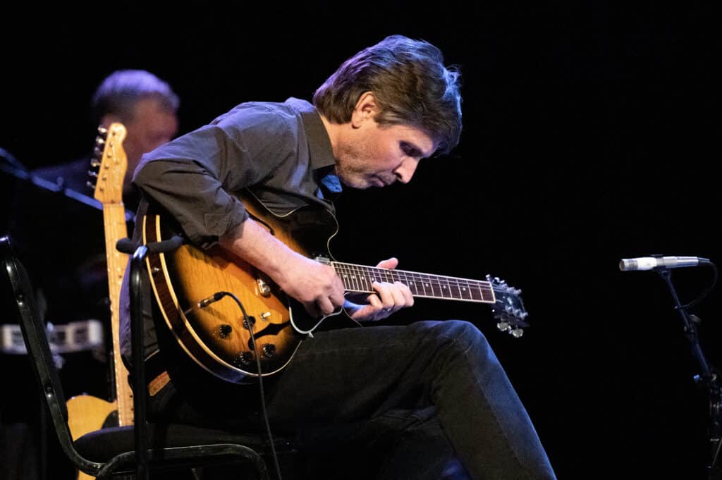 Guitarist & songwriter Michael Timmins of Cowboy Junkies performing live onstage