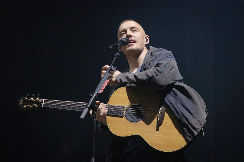 Irish singer Dermot Kennedy performing live on stage