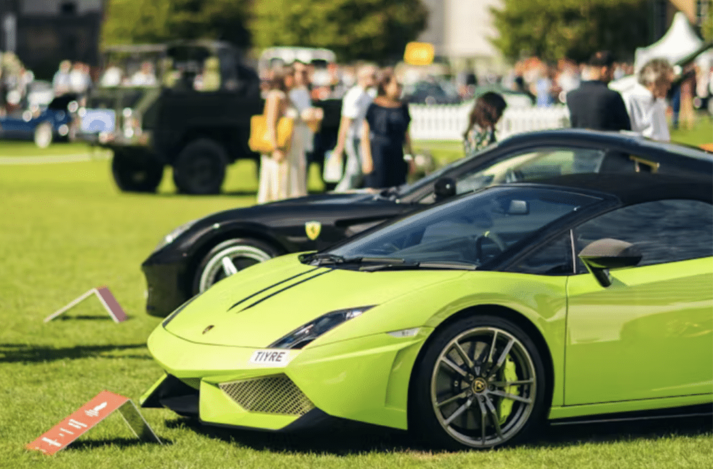 A green Lamborghini parked on a field for the London Concourse event