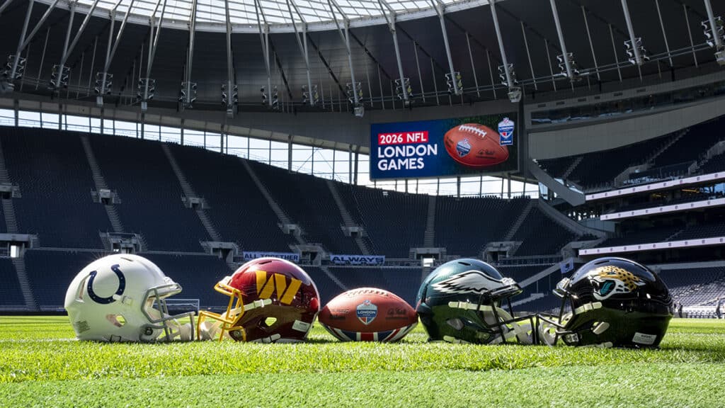 Four American football helmets and an American football in Tottenham Hotspur stadium
