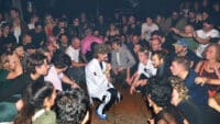 Joe Love of Fat Dog performs amongst the audience at Urban Spree in Berlin, Germany