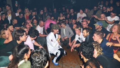 Joe Love of Fat Dog performs amongst the audience at Urban Spree in Berlin, Germany