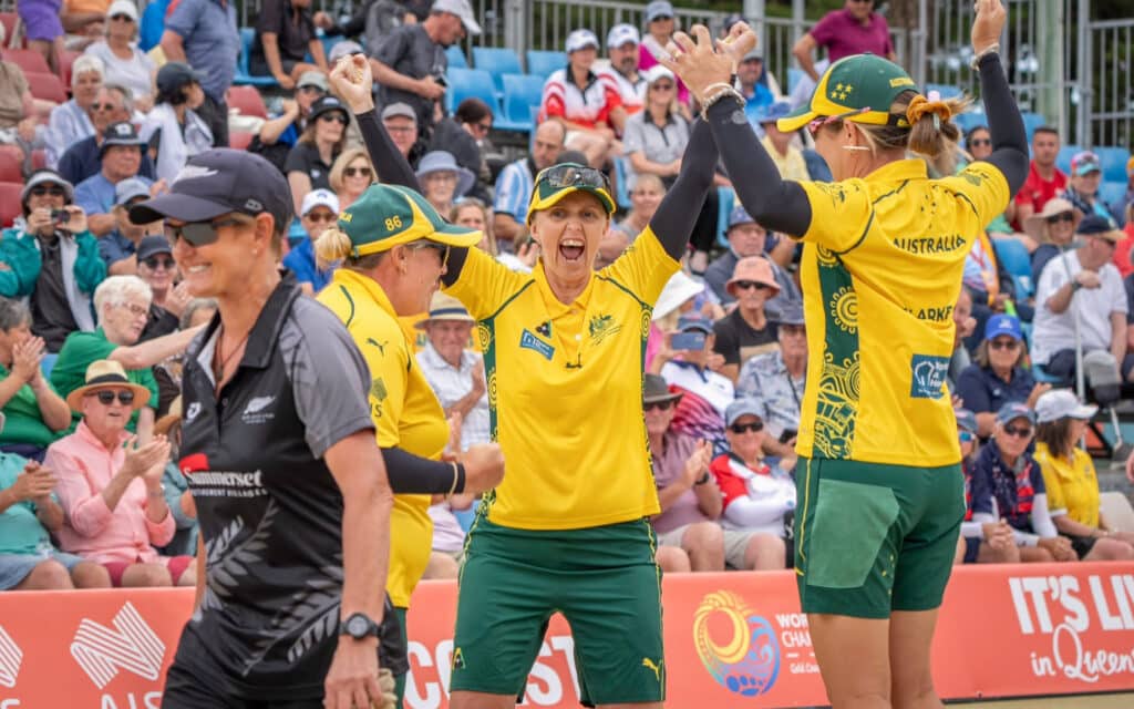 The Australian bowling team celebrate a win