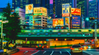 A street at night in Shinjuku, Tokyo, Japan. Photo credit Chunyip Wong.