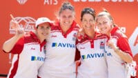 A team of bowlers pose for a photo at the World Bowls Championship