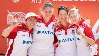 A team of bowlers pose for a photo at the World Bowls Championship