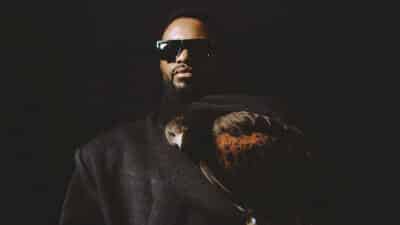 Fally Ipupa holding an eagle