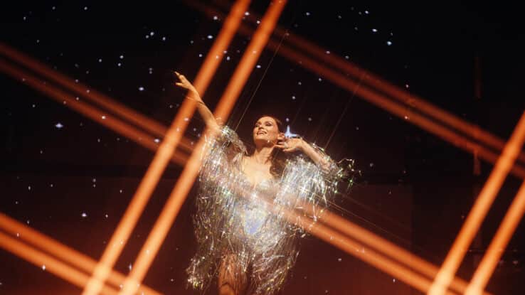 Sophie Ellis-Bextor dancing in a grid of diffused disco light